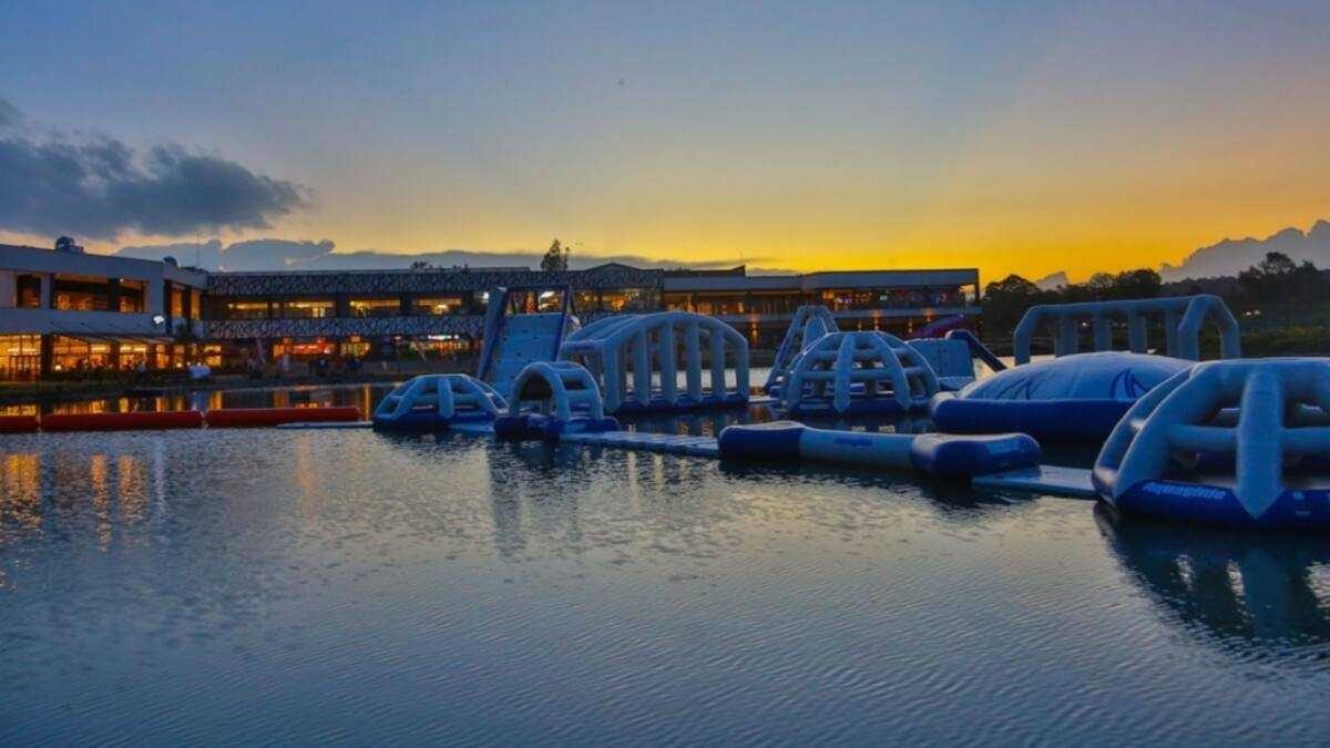 Maji Magic Aqua Park on the lake at The Waterfront Karen, at dusk